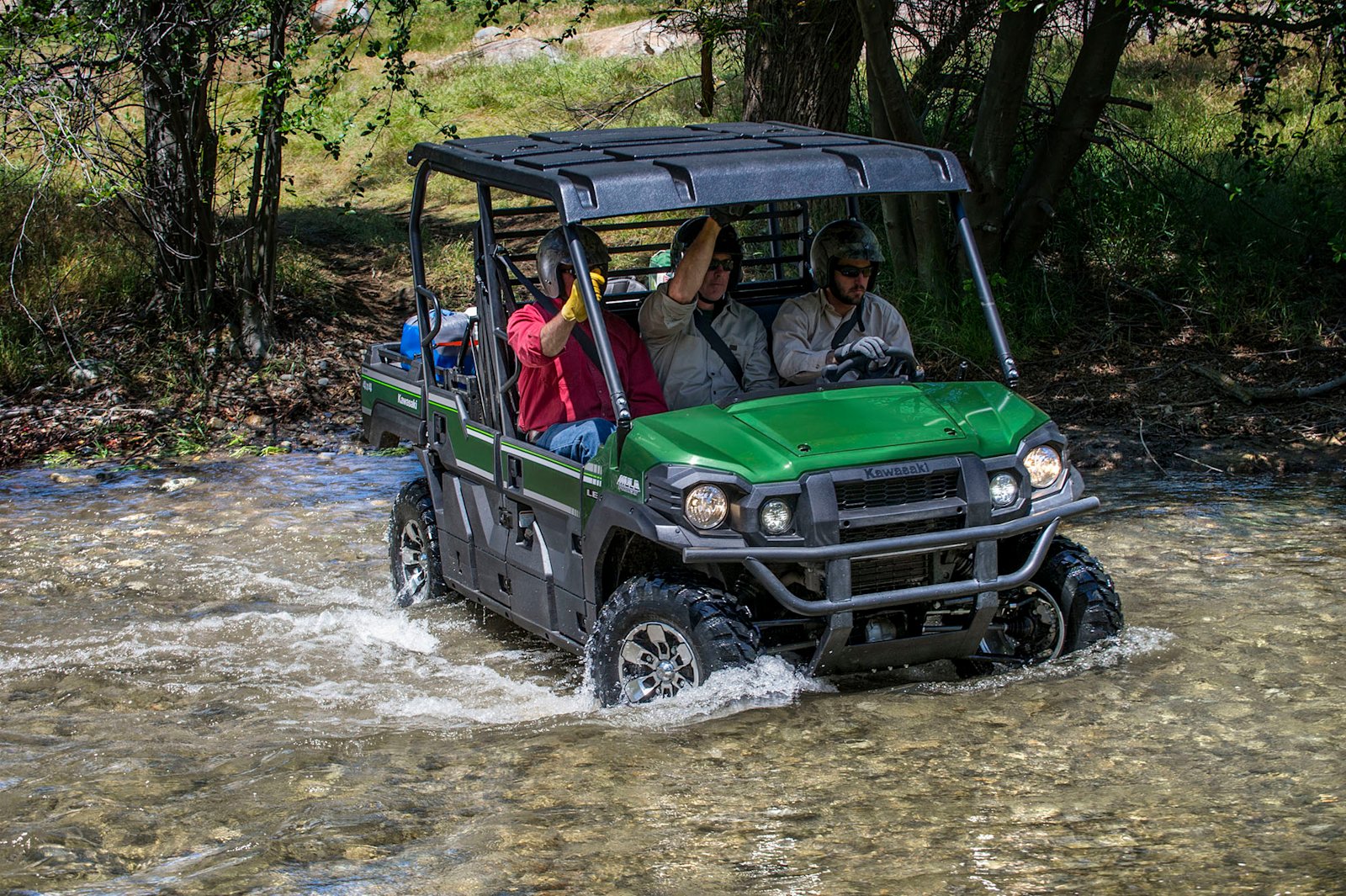 Kawasaki side-by-side crossing a stream