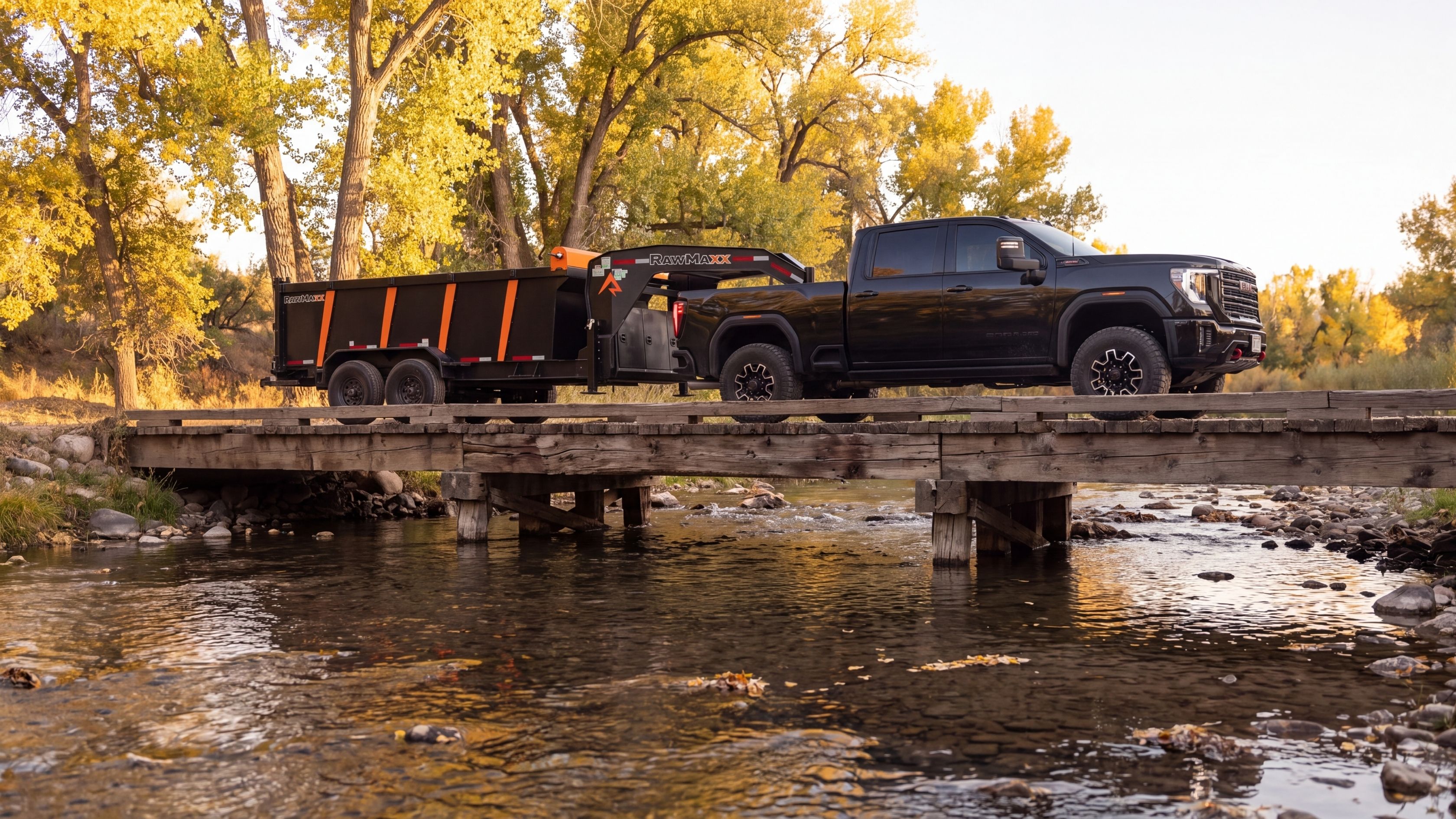 RawMaxx trailer and truck on a country bridge